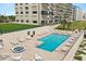 Enjoy the community pool and hot tub with plenty of seating in this resort-style living environment at 4621 S Atlantic Ave # 7202, Port Orange, FL 32127