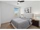 Serene bedroom with neutral decor, a comfortable bed, and soft lighting for a relaxing ambiance at 4759 Riverwalk Dr, St Cloud, FL 34771