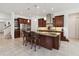 Gourmet kitchen with granite countertops, stainless steel appliances, and a spacious center island at 4759 Riverwalk Dr, St Cloud, FL 34771