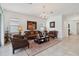 Sophisticated living room featuring tile flooring, recessed lighting, and traditional-style furniture at 4759 Riverwalk Dr, St Cloud, FL 34771
