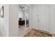 Bright entryway showcasing an office space with tile flooring and a ceiling fan at 4759 Riverwalk Dr, St Cloud, FL 34771