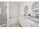 Bright bathroom features double sinks, soaking tub, and walk-in shower at 504 Key Haven Dr, Sanford, FL 32771