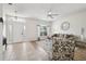 Inviting living room featuring a large window, elegant decor, and comfortable seating at 504 Key Haven Dr, Sanford, FL 32771