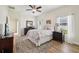 Light-filled main bedroom features a ceiling fan and two windows at 504 Key Haven Dr, Sanford, FL 32771