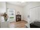 Bright office space featuring a window, wood floors, and a closet at 504 Key Haven Dr, Sanford, FL 32771