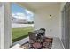 Outdoor seating on the patio, with a view of the backyard at 504 Key Haven Dr, Sanford, FL 32771