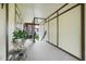 Charming front porch area with ample space and natural light, perfect for relaxation at 5323 Hansel Ave # E14, Orlando, FL 32809