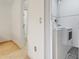 Laundry room with full-size washer and dryer and access to bathroom at 5323 Hansel Ave # E14, Orlando, FL 32809