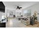 Inviting living room with neutral tones, comfortable seating, and plenty of natural light at 5323 Hansel Ave # E14, Orlando, FL 32809