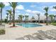 Spend time at the luxurious community pool complete with lounge chairs and palm trees for relaxation at 5395 Sunshine Dr, Wildwood, FL 34785