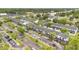 An aerial view of a multifamily home showcasing its parking, landscaping, and overall community layout at 5662 Royal Pine Blvd # 24, Orlando, FL 32807