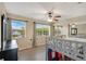 Bedroom with a bunk bed, large windows and a mirrored closet maximizes space and light at 5662 Royal Pine Blvd # 24, Orlando, FL 32807