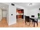 An eating area adjacent to the kitchen with a table set at 5662 Royal Pine Blvd # 24, Orlando, FL 32807