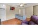 Comfortable living area featuring sleek furniture, wood floors, and neutral tones at 5662 Royal Pine Blvd # 24, Orlando, FL 32807