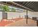 Cozy patio area with stone pavers and decorative landscaping offers a serene outdoor retreat at 5662 Royal Pine Blvd # 24, Orlando, FL 32807