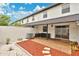 Enclosed patio with stone pavers provides a private outdoor space for relaxation and entertainment at 5662 Royal Pine Blvd # 24, Orlando, FL 32807