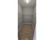 Walk-in closet with tile flooring and wire shelving system at 607 Escondido Ct, Kissimmee, FL 34758
