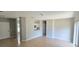 Open-concept living area featuring tile flooring and an eat-in kitchen at 607 Escondido Ct, Kissimmee, FL 34758