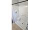 Tiled shower with built in seat and grab bar at 607 Escondido Ct, Kissimmee, FL 34758