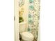 Bathroom featuring toilet and floral shower curtain at 608 Washington Way, Haines City, FL 33844