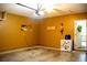 Interior view of the garage showing the painted walls and concrete flooring at 608 Washington Way, Haines City, FL 33844