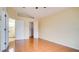 Empty bedroom with tile floors, walk in closet and view to the bathroom at 611 Jura Ln, Kissimmee, FL 34759