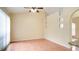 Living room with tile floors, ceiling fan, and open layout at 611 Jura Ln, Kissimmee, FL 34759