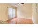 Living room with ceramic tile floors and sliding door window at 611 Jura Ln, Kissimmee, FL 34759