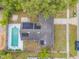 Aerial view of property showcasing roof and pool at 614 S Amelia Ave, Deland, FL 32724