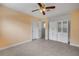 Bedroom with terrazzo floors, closet and storage at 614 S Amelia Ave, Deland, FL 32724