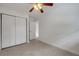 Bedroom highlighting closet and view into hallway at 614 S Amelia Ave, Deland, FL 32724