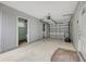 Spacious two car garage with high ceilings and convenient access door at 614 S Amelia Ave, Deland, FL 32724