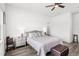 This serene main bedroom is bright and offers a comfortable space to relax and unwind at 6348 Mossy Oak Rd, St Cloud, FL 34771