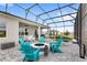 Relax and entertain on this spacious screened lanai with a pool and firepit at 6348 Mossy Oak Rd, St Cloud, FL 34771