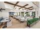 Restaurant dining area with tables, chairs, bar, and large windows at 6348 Mossy Oak Rd, St Cloud, FL 34771
