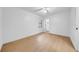 Bedroom with a ceiling fan, a window for natural light, and a walk-in closet at 6505 Dorchester Rd, Lakeland, FL 33809