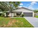 Charming single-story home with a well-manicured lawn and inviting curb appeal at 6505 Dorchester Rd, Lakeland, FL 33809