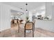 Cozy dining area next to kitchen features sleek white cabinets at 6505 Dorchester Rd, Lakeland, FL 33809