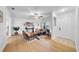 Bright living room with hardwood floors, ceiling fan and modern furnishings at 6505 Dorchester Rd, Lakeland, FL 33809