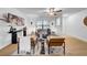 Bright living room with hardwood floors, ceiling fan and modern furnishings at 6505 Dorchester Rd, Lakeland, FL 33809