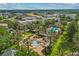 Aerial view of the community, showcasing the pool, common areas, and surrounding neighborhood at 7509 Mourning Dove Cir # 302, Reunion, FL 34747