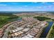A picturesque aerial view of an upscale community with interconnected waterways at 8106 Mabury Ln, Orlando, FL 32832