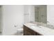 Modern bathroom featuring a granite vanity and glass-enclosed shower at 8106 Mabury Ln, Orlando, FL 32832
