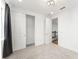 Bright bedroom features a large closet, neutral carpet, and an ensuite entrance at 8106 Mabury Ln, Orlando, FL 32832