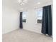 Carpeted bedroom with great natural light from dual windows at 8106 Mabury Ln, Orlando, FL 32832