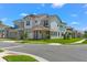 Beautiful single-Gathering home features manicured landscaping, a two-car garage, and sidewalk at 8106 Mabury Ln, Orlando, FL 32832
