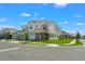 Exterior view of an upscale two-story home in a suburban neighborhood at 8106 Mabury Ln, Orlando, FL 32832