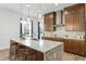 Stylish kitchen featuring a granite countertop island and stainless steel appliances at 8106 Mabury Ln, Orlando, FL 32832