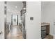 Kitchen space featuring wood-look flooring, granite countertops, stainless steel appliances, and ample storage at 8106 Mabury Ln, Orlando, FL 32832