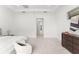 Expansive main bedroom providing ample space, soft carpeting, with en-suite bath at 8106 Mabury Ln, Orlando, FL 32832